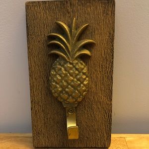 Wood-mounted brass pineapple wall hook